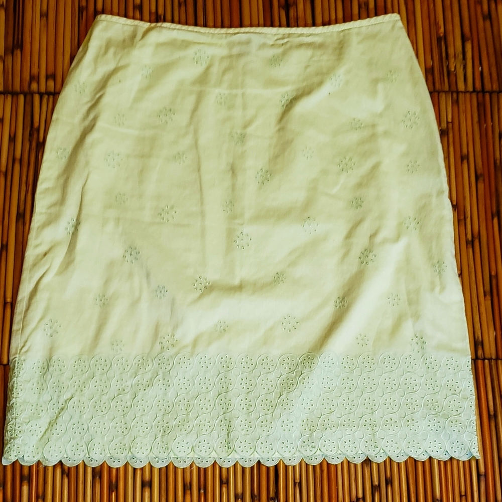 ANN TAYLOR Skirt; knee length with eyelet hemline.